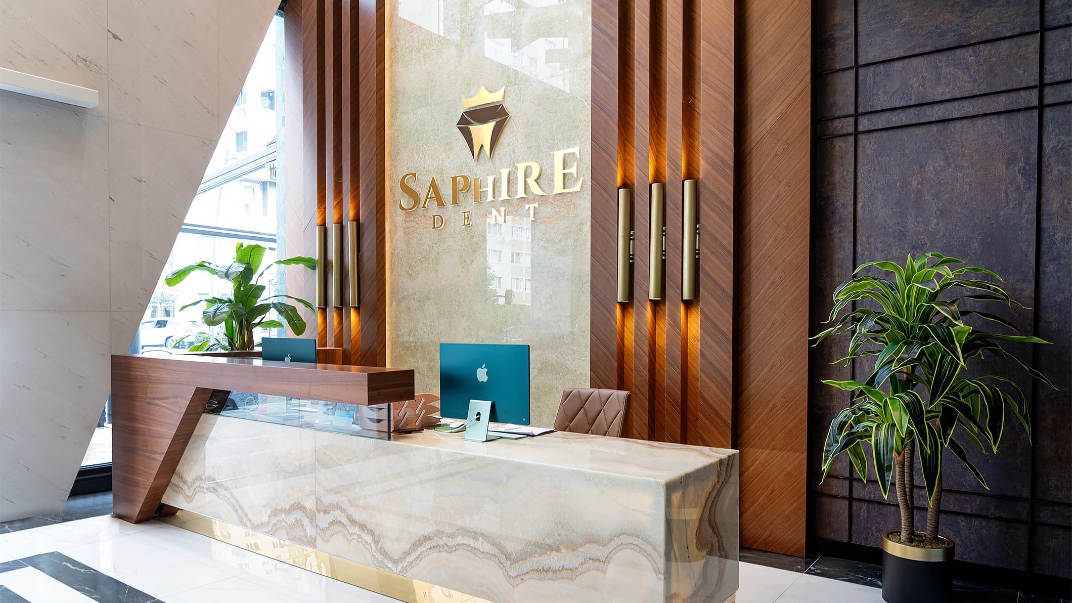Modern dental clinic reception area in Istanbul with professional staff and comfortable seating