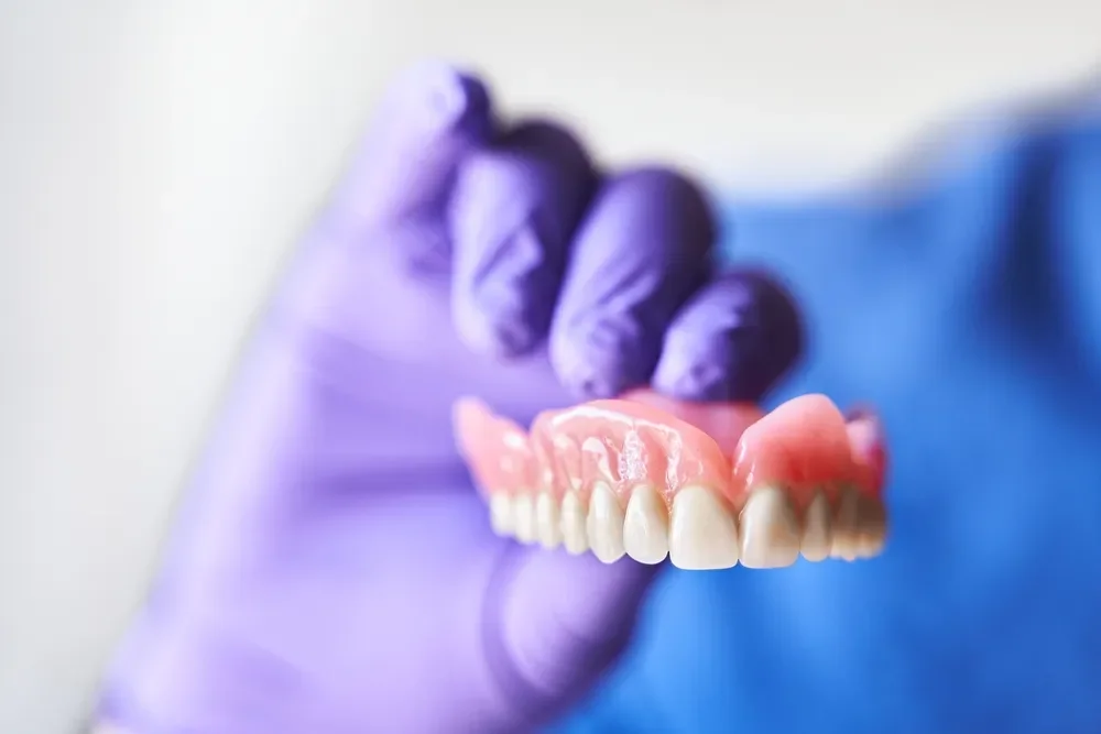 Implants vs. Dentures: Which Choice is Right for Your Lifestyle?